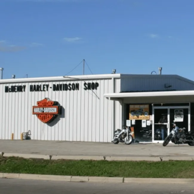 McHenry Harley-Davidson dealership with motorcycles displayed inside and outside the facility