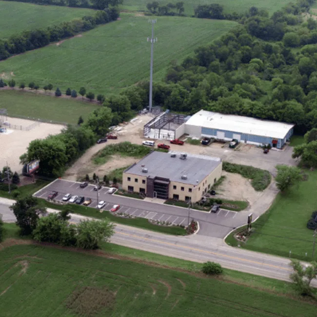 Aerial view of an office and manufacturing campus with integrated administrative and production facilities, Crystal Lake, IL