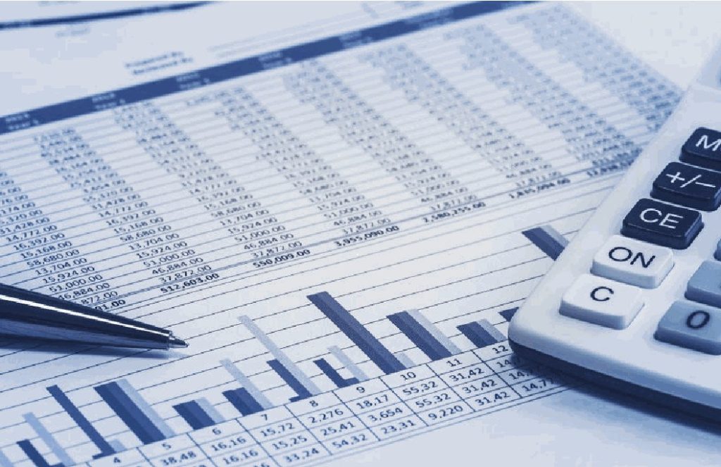 Construction cost spreadsheet and a calculator used to price materials