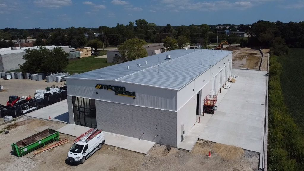 New metal sales and service building with a service van outside in Wauconda, Illinois