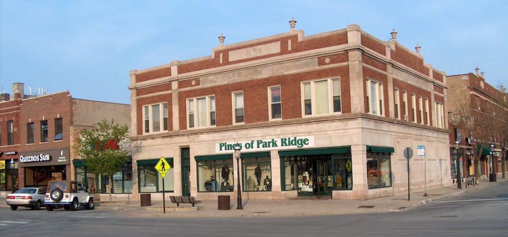 Two storey brick corner retail building with ground floor shopfronts in Park Ridge, Illinois