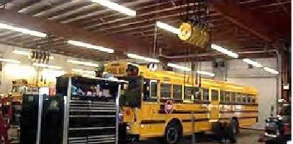 Buses in Garage at Woodstock School District 200 in in Woodstock, Illinois